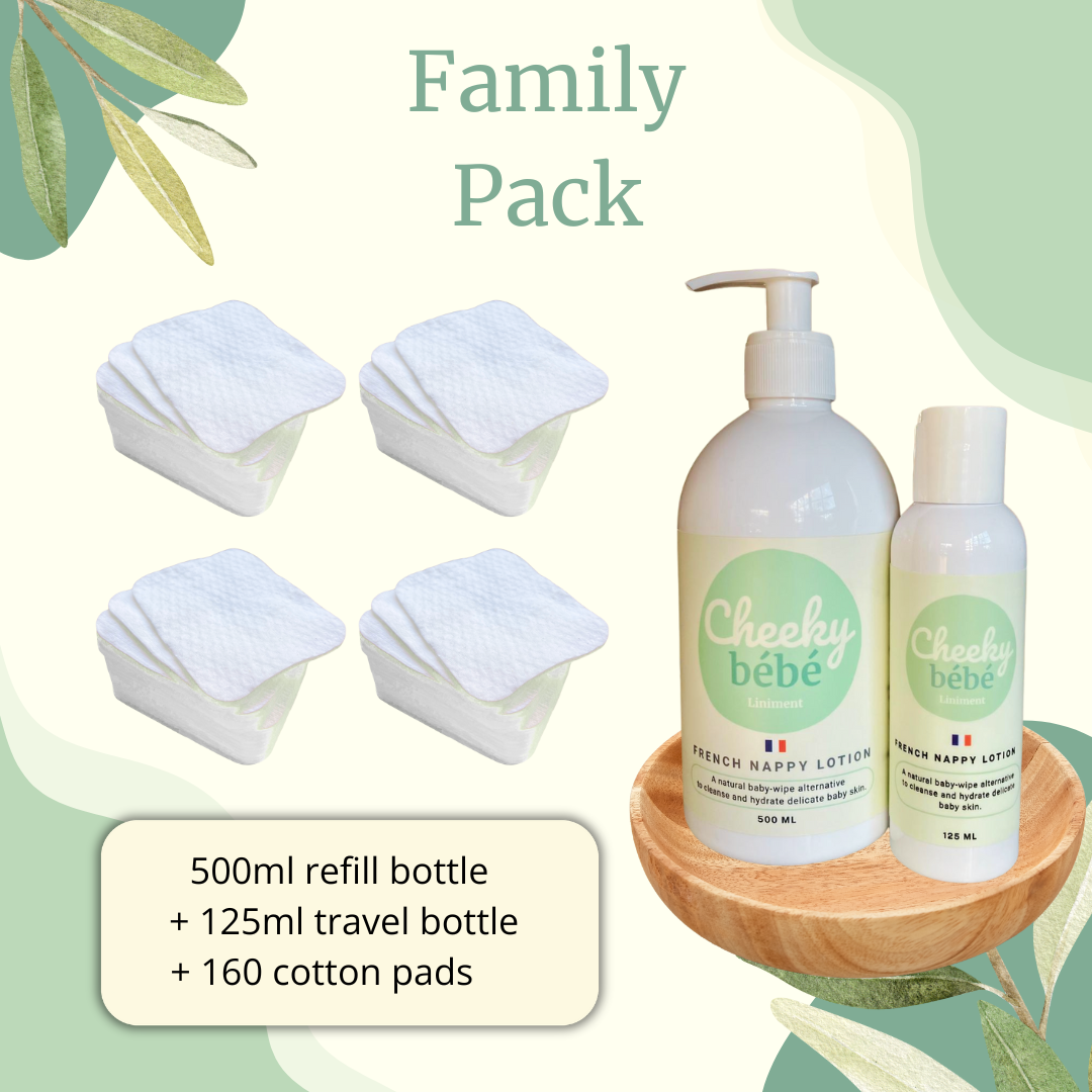 Cheeky Bébé Full Family Pack: a 500mL bottle and a 125mL travel bottle of baby liniment with four packs of organic cotton pads